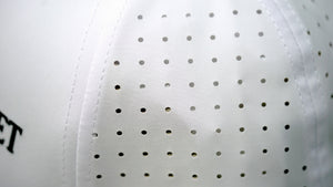 Close-up view of Audemars Piguet white cotton perforated material
