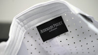 Inside view of Audemars Piguet white cotton hat with Le Brassus label