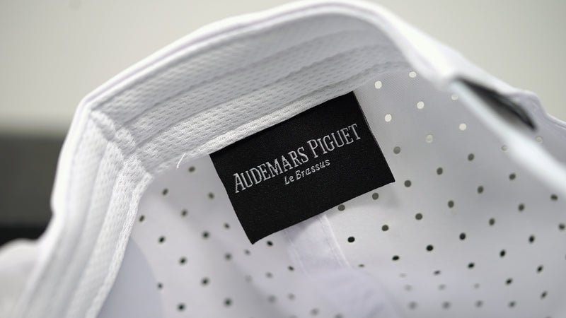 Inside view of Audemars Piguet white cotton hat with Le Brassus label