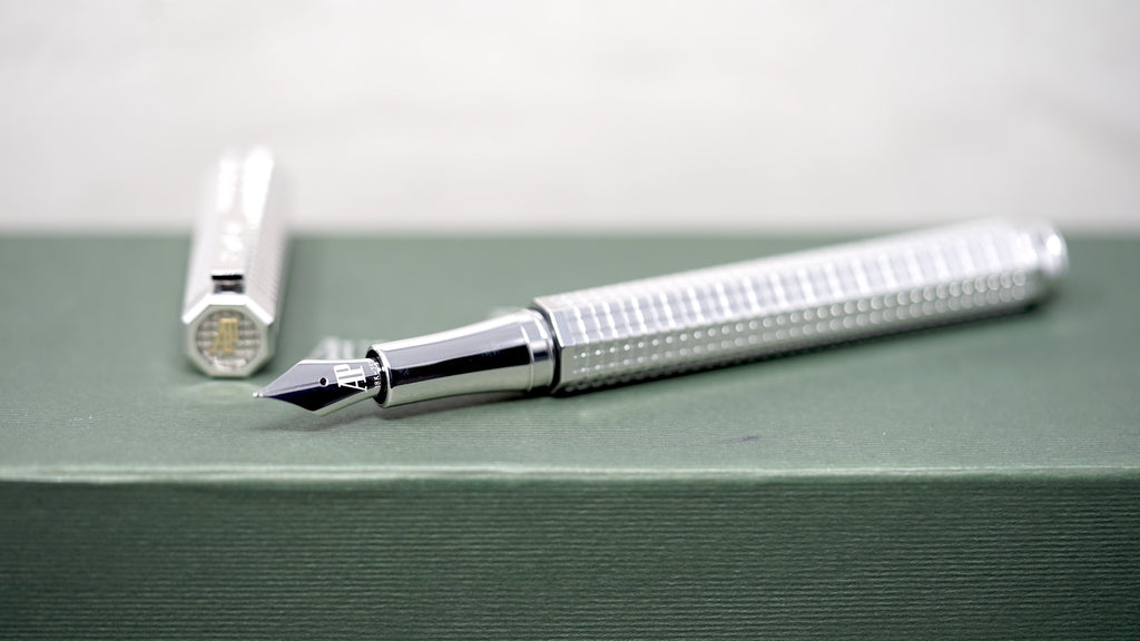 Front view of Audemars Piguet Royal Oak fountain pen in 18K rose and white gold