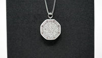 Close-up of Audemars Piguet Royal Oak Frosted Steel Pendant surface texture and craftsmanship