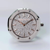 Close-up of Audemars Piguet Royal Oak frosted dial desk clock stainless steel case