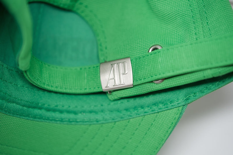 Detail of adjustable strap and inner sweatband in lime green Audemars Piguet hat