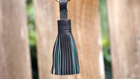 New Authentic Audemars Piguet Royal Oak Tassel Keychain in Black with Green Leather Tassels  and Gold Ring for Luxury Cars For Sale by Time Traders Online 