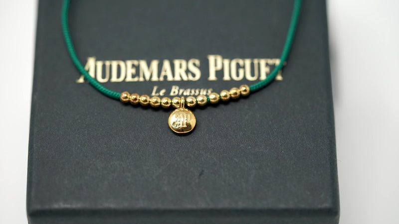 Authentic Audemars Piguet Bracelet in 14K Gold Green Cord