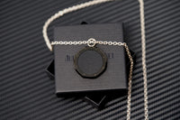 Audemars Piguet black carbon medallion pendant bail opening