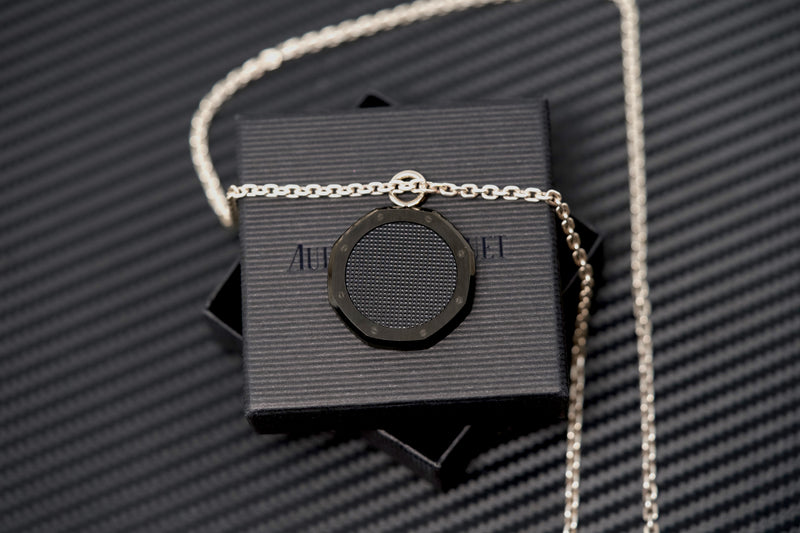 Audemars Piguet black carbon medallion pendant bail opening